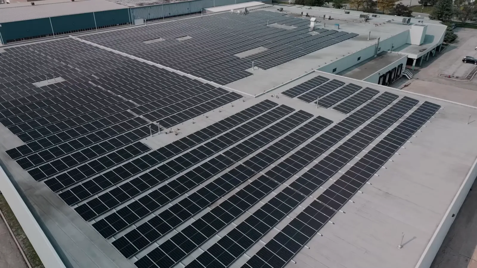 Commercial rooftop solar array with Solis inverter on a Canadian C&I facility