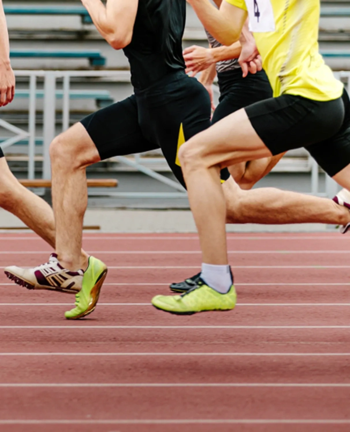 Canadian track athletes mid-race — Sport & wellbeing initiative