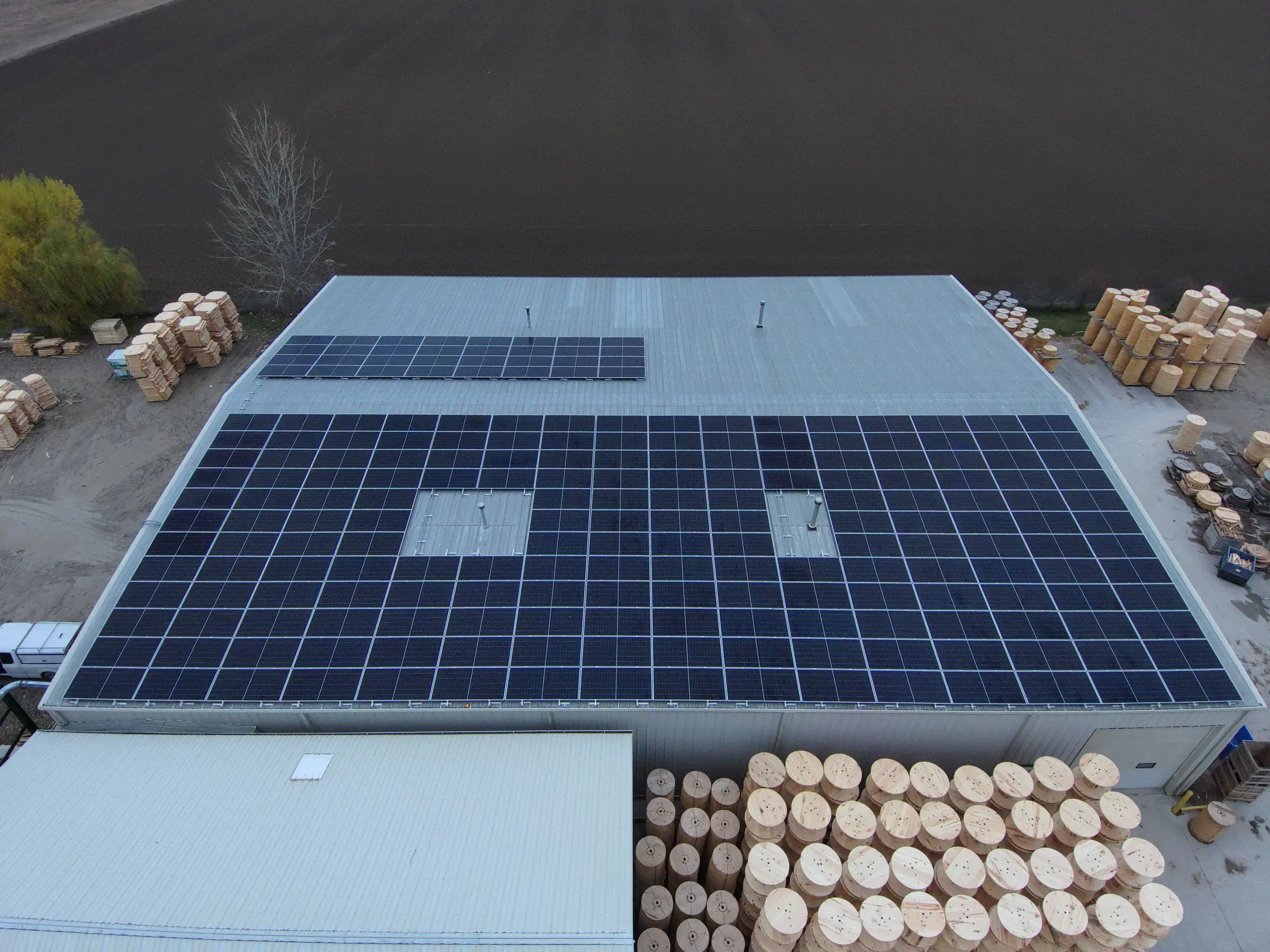Hero — 124.7 kW rooftop solar offsetting 99.4% of electricity at a wood products manufacturer in Tilbury, Ontario