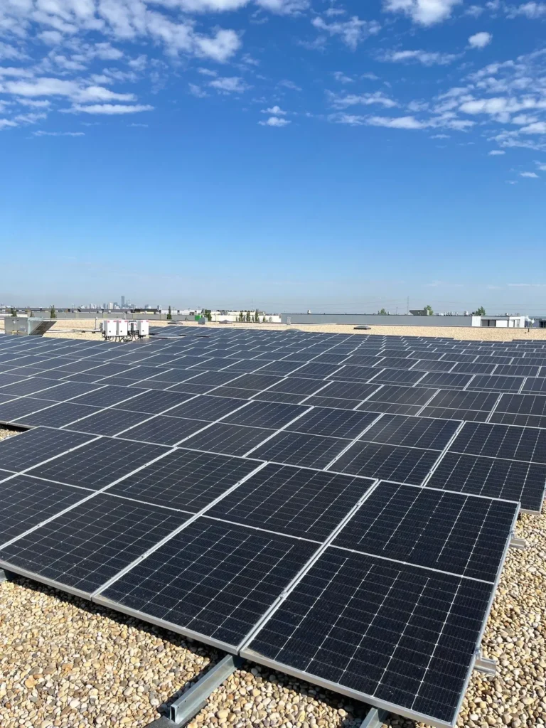 172.8 kW rooftop solar offsetting 90.8% of electricity at an industrial distributor in Edmonton, Alberta